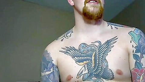 Teen girl with tattooed body enjoys sex with a large sex toy