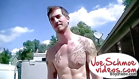 A sexy brunette shows us her tattooed body outdoors